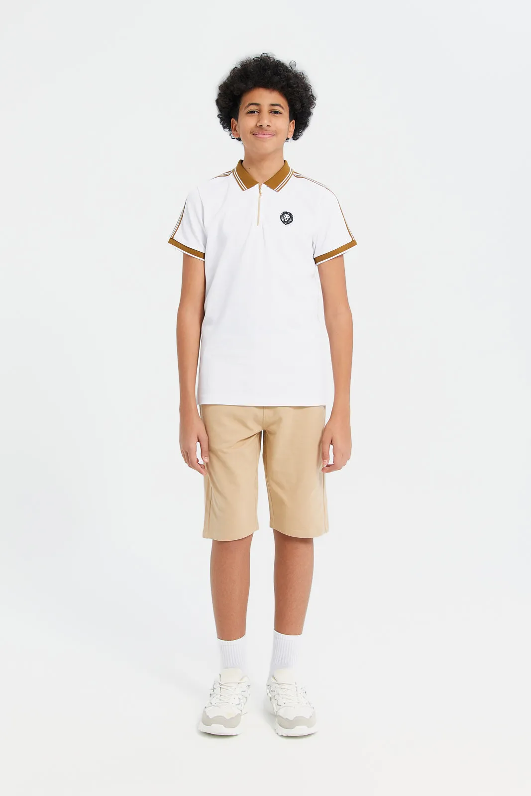Senior Boys White Zip Neck Polo With Shoulder Tape