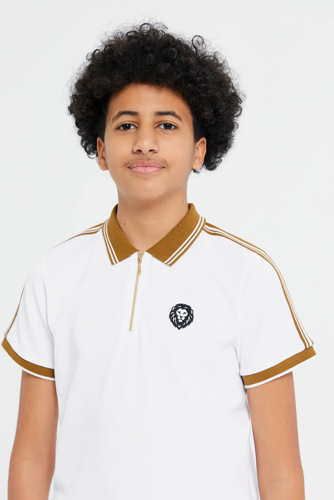 Senior Boys White Zip Neck Polo With Shoulder Tape